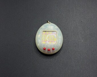 BANDAI ORIGINAL Tamagotchi White With Blue Detail - #1800, 1996