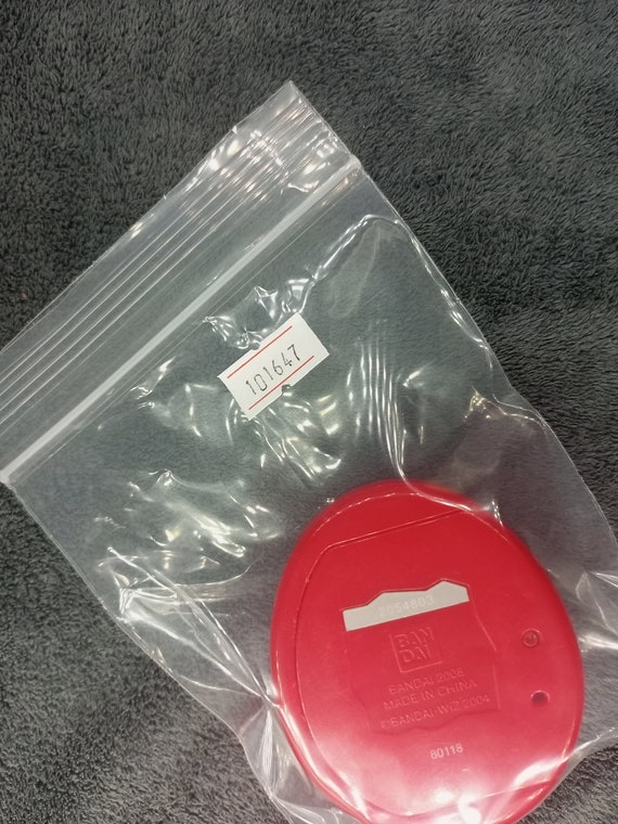 BANDAI Tamagotchi EXILE レッド 2008 il_fullxfull.4362580305_irvn.jpg