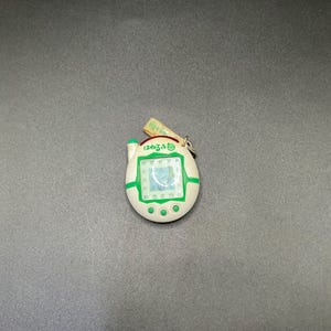 SKU B404P4579 | Bandai Tamagotchi Plus Keitai Hanerutchi V3 Japanese version
