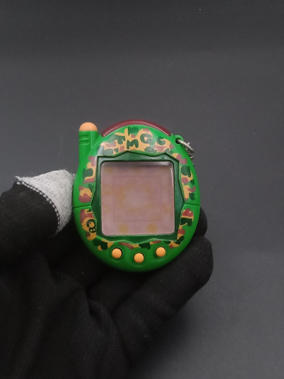 SKU B1083P13385TA5 | Tamagotchi Green Connection V3 V-pet Bandai