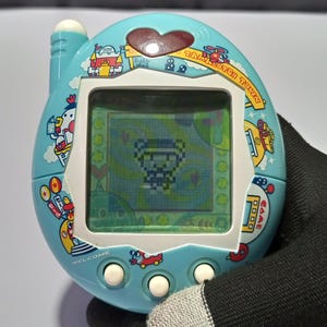 Tamagotchi Id L - Etsy