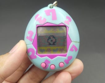 SKU B987P12113 | Tamagotchi P1/P2 Pink Bandai Japanese