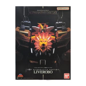 May include: A box featuring a detailed image of a robot with a lion's head. The robot is primarily red, orange, and gold, with black accents. The text "ALTERNATIVE DESTINY" and "LIVEROBOT" are visible on the box, along with the Bandai Namco logo.