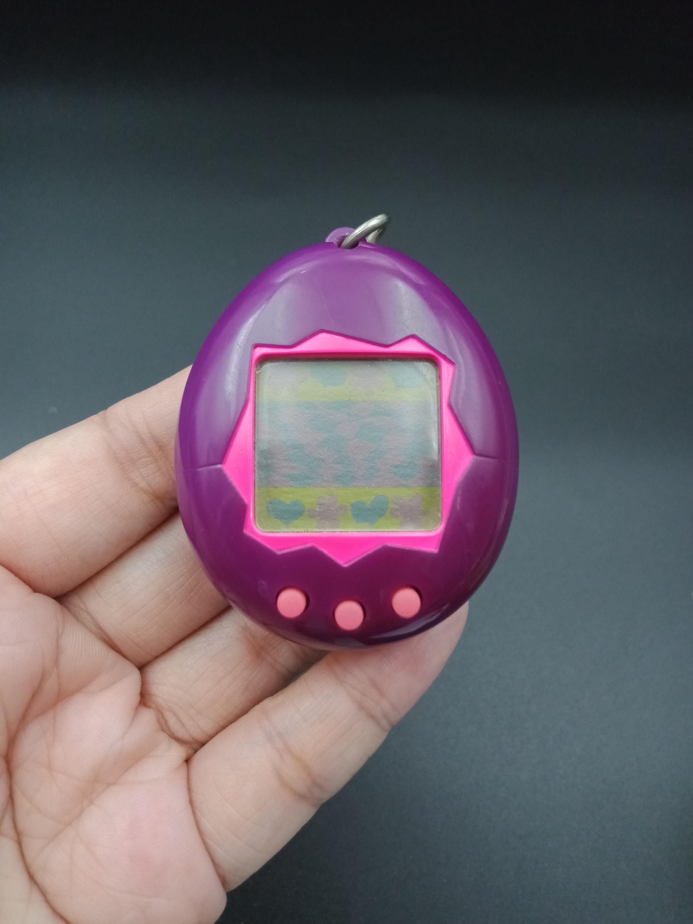 SKU YU1 | Tamagotchi P1/P2 Purple Pink Bandai English Version