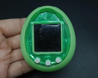 SKU B697P7263 | Tamagotchi Id Green White Button Bandai Virtual