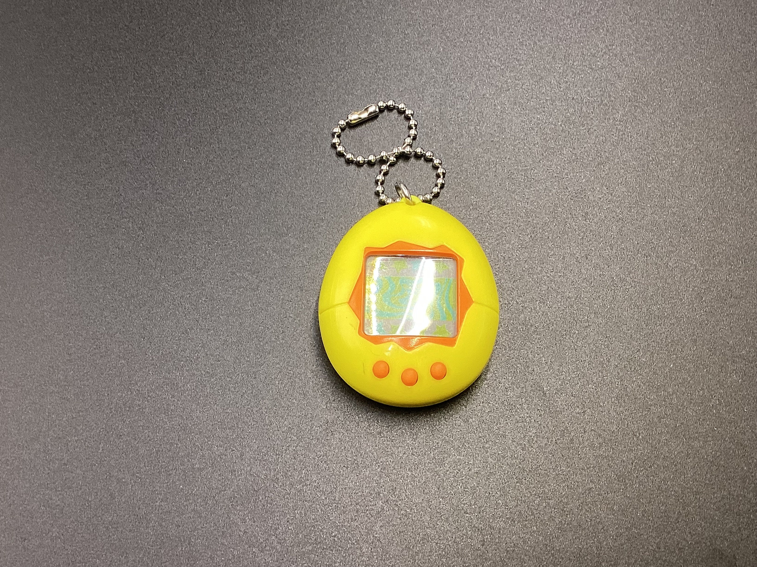 Tamagotchi Original P1/P2 yellow w/ orange Bandai 1997 English