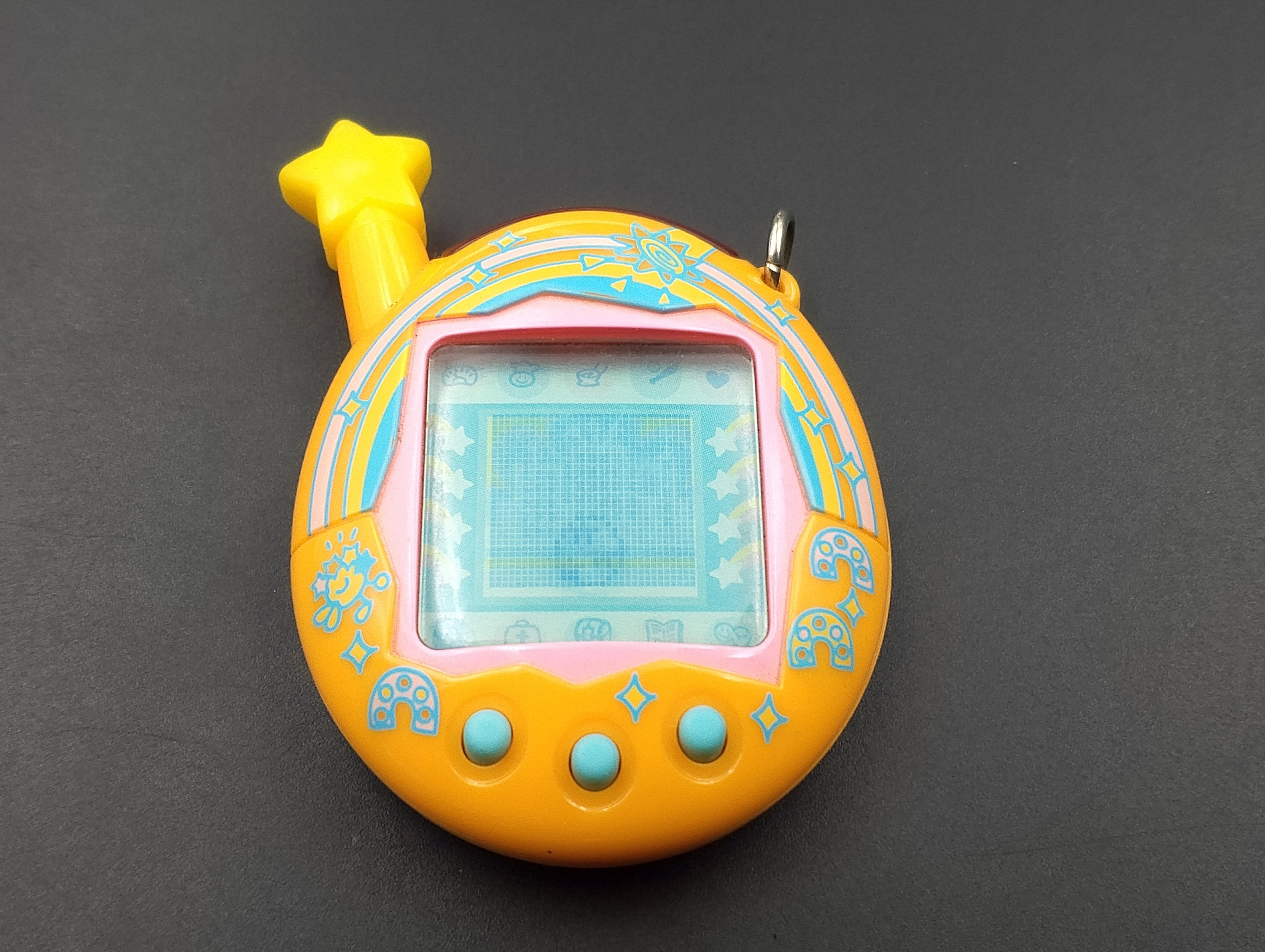 SKU TB F56 | Tamagotchi Connection V4.5 Orange Yellow Good SKU TB F56 | Tamagotchi Connection V4.5 Orange Yellow Good