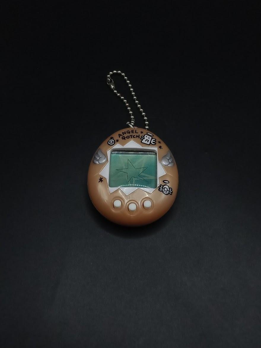 ＡＮＧＥＬ ＧＯＴＣＨ Tamagotchi Angel Gotch BANDAI White Pink Silver New TMGC
