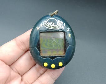 SKU YU129 | Tamagotchi P1/P2 Blue Spaceship Bandai Japanese Toy