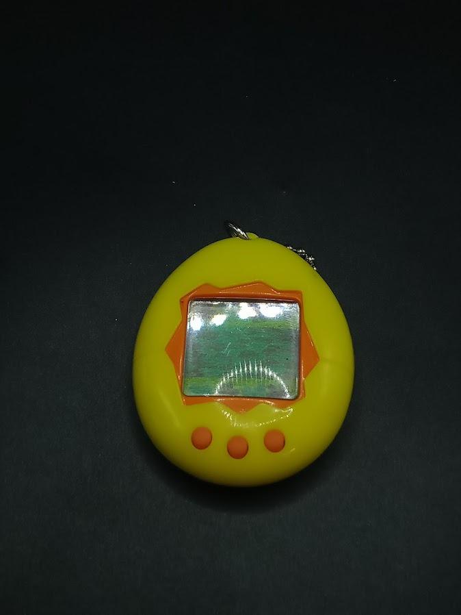 Yellow Tamagotchi - Etsy Canada