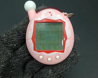 Artikelnummer B796P8945 | BANDAI Chou Jinsei Tamagotchi Plus roze