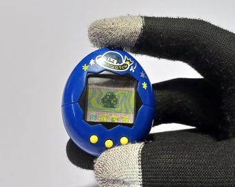691907008 | Tamagotchi First Generation Navy Blue Bandai