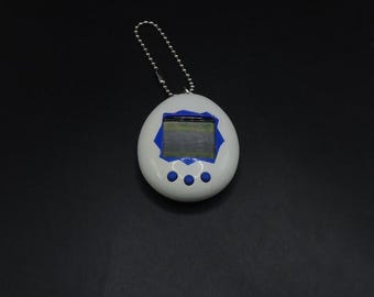 BANDAI Tamagotchi 青 Amazon.com: Bandai Tamagotchi Paradise - Blue Water Recommended