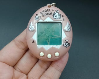 SKU YU148 | Bandai Japanese Tamagotchi Angel Gotch pink