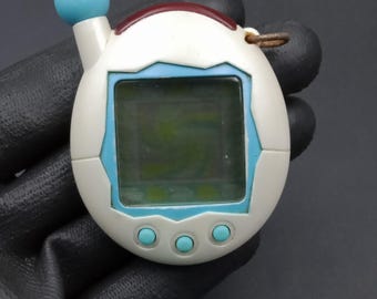 SKU B697P7255 | バンダイ たまごっち 初代 青 バーチャルペット