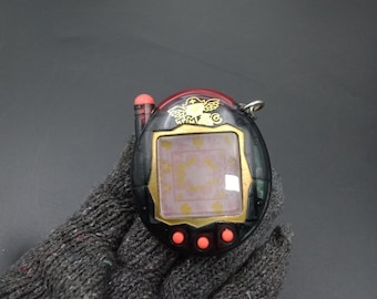 SKU B786P882 | BANDAI Feier Keitai Kai Zwei Tamagotchi Plus Red Serie Pirates Black japan