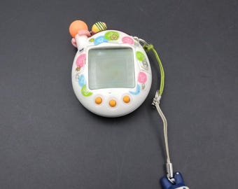 BANDAI ORIGINAL Tamagotchi White With Blue Detail - #1800, 1996