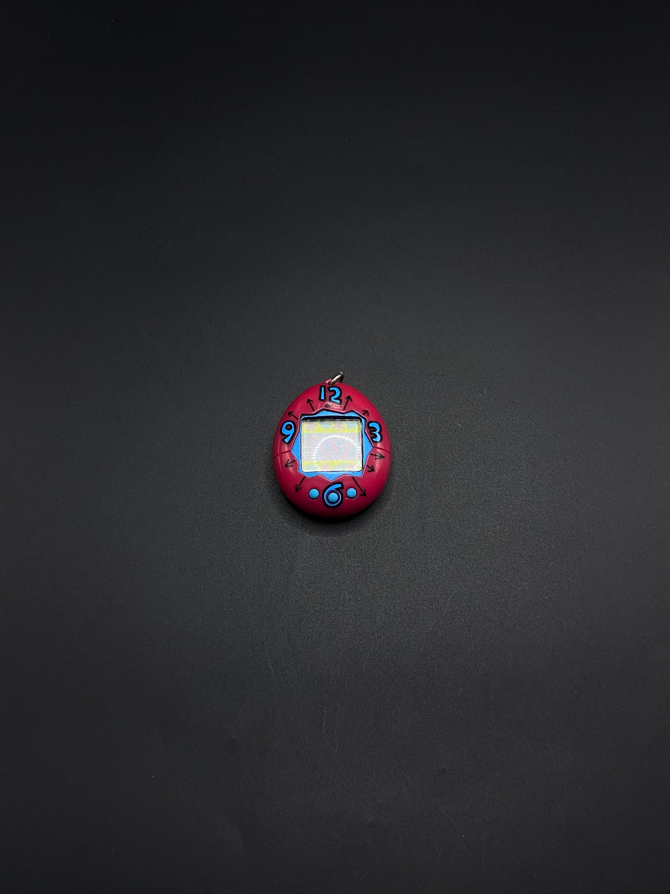 SKU B83P541 | Tamagotchi Pink Clock Pattern Authentic Bandai