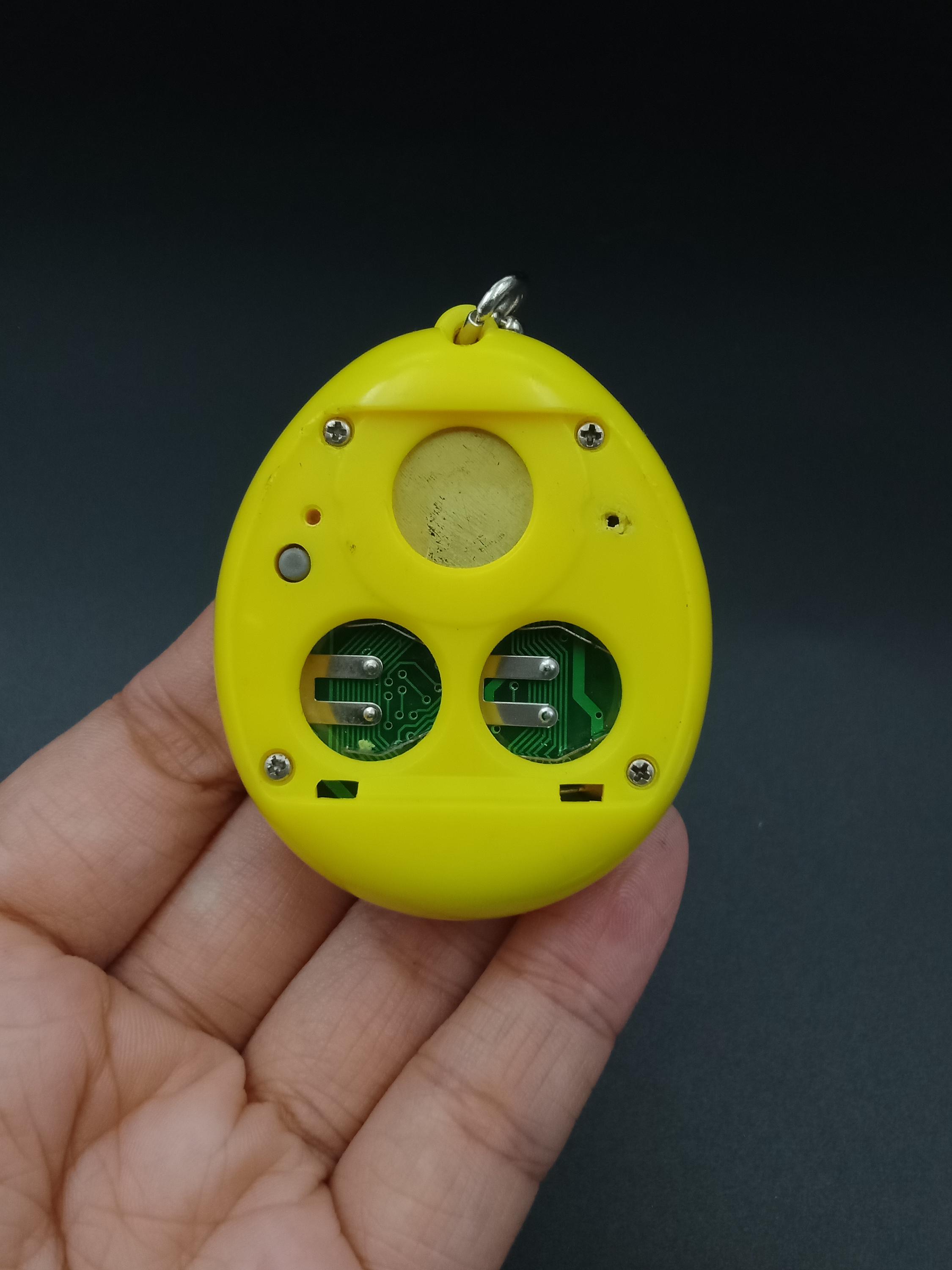 SKU B697P7259 | Tamagotchi P1/P2 Yellow Orange Bandai Japan - Etsy