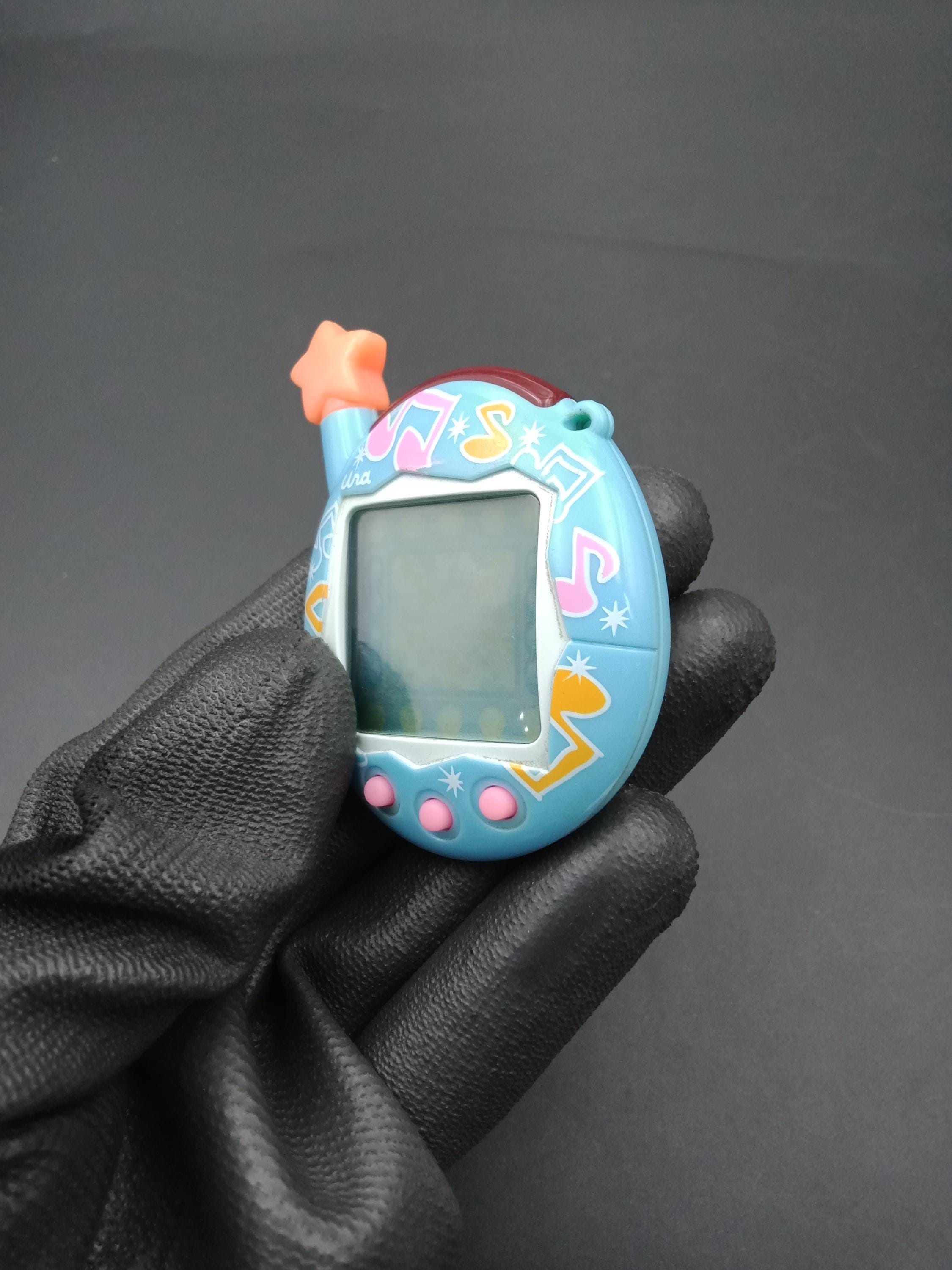 SKU B833P9942 | Bandai Japanese Tamagotchi V4.5 Uratama Music Blue