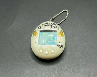 タマゴッチ ホワイト 1997年 SKU B566P5448 | Tamagotchi White Angel Goth Japanese Version