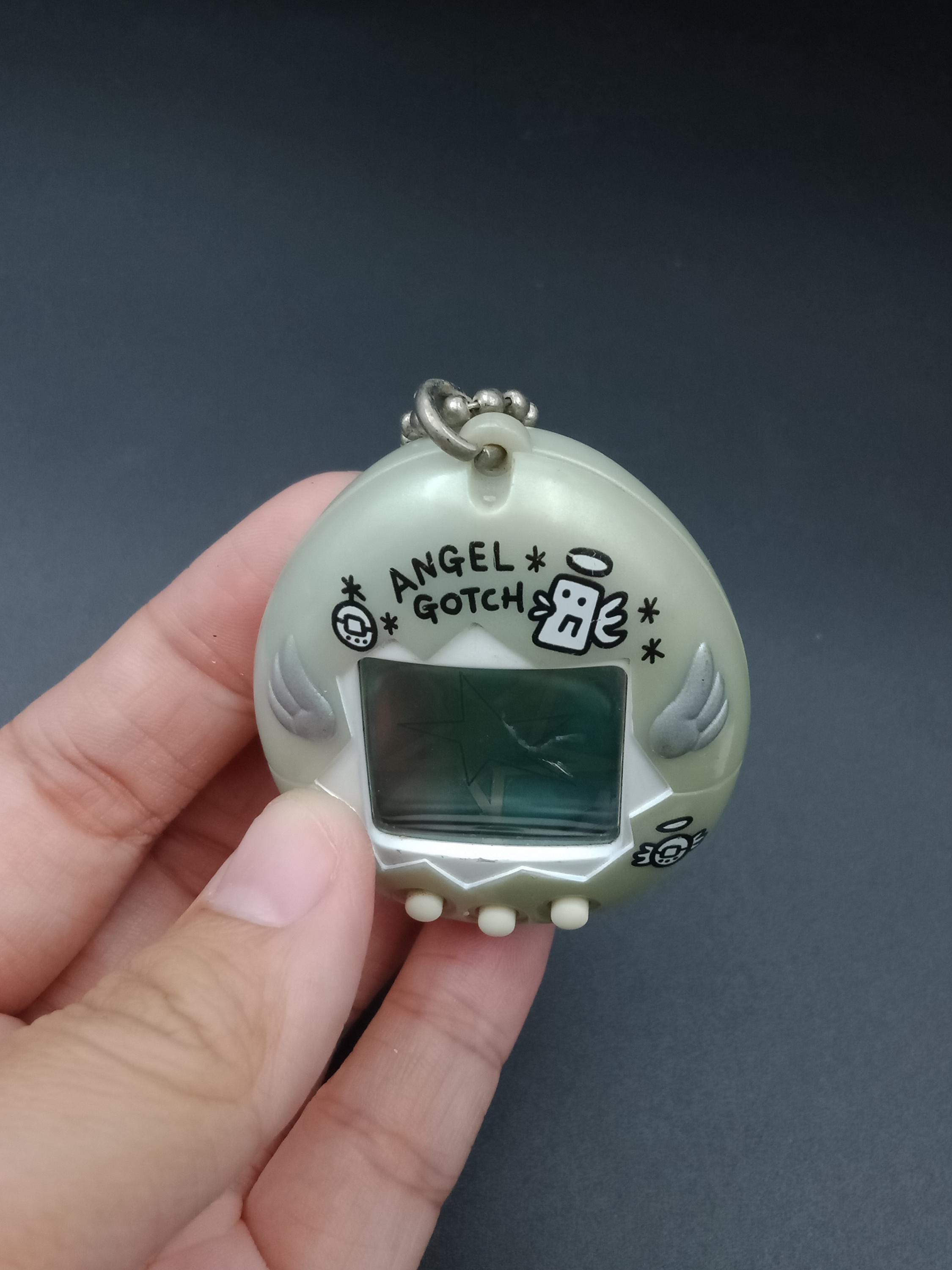 SKU YU147 | Bandai Japanese Tamagotchi Angel Gotch Silver Toy - Etsy