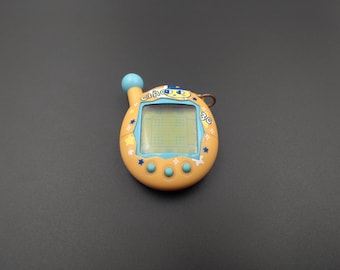 SKU B668P6922TA5 | バンダイ たまごっちプラス けいたまえんたま