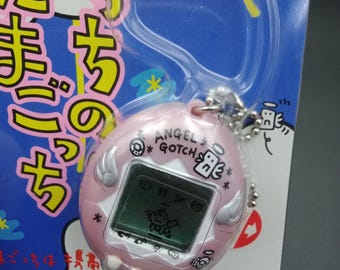 SKU B825P9756 | Bandai Tamagotchi Angel Gotch Japanese Silver