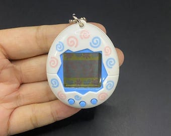 SKU G019 | Tamagotchi IDL 15th Anniversary Purple V Pet Toy Japan