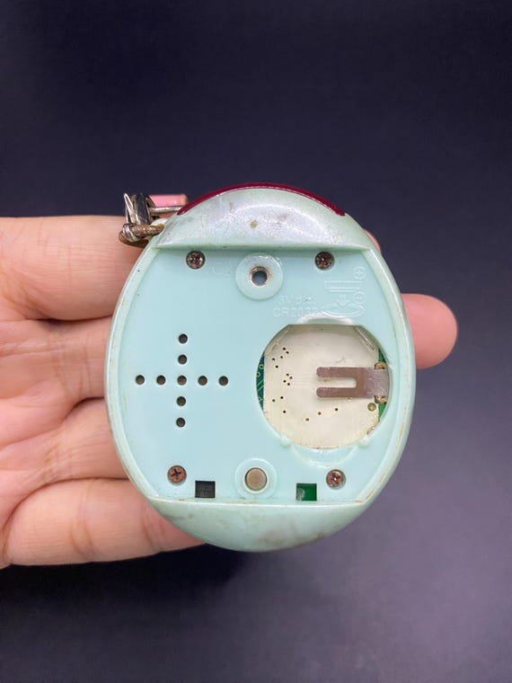 SKU B639P6705TA5 | Tamagotchi Plus Connection Version 1 Light Blue