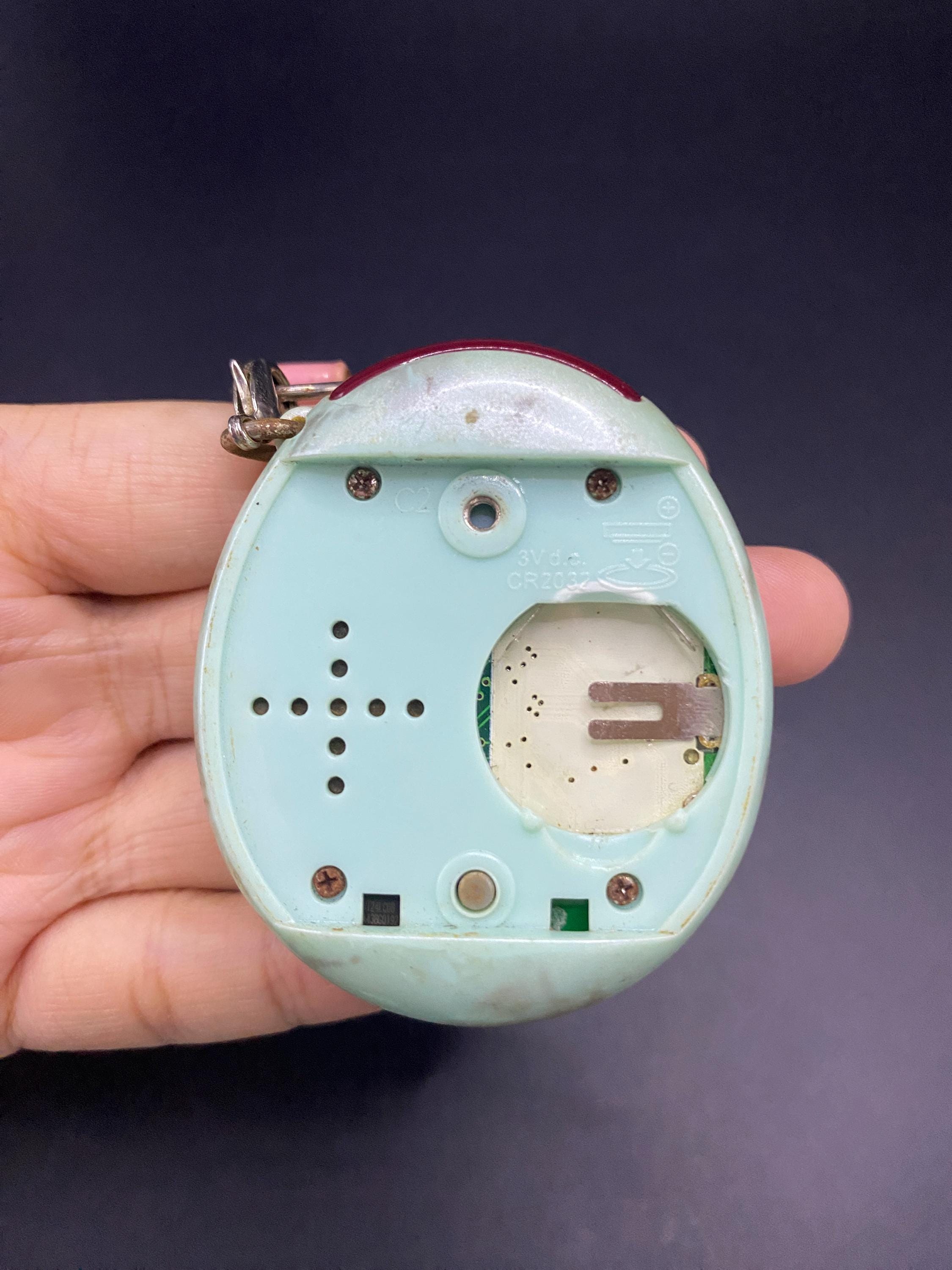 SKU B639P6705TA5 | Tamagotchi Plus Connection Version 1 Light Blue