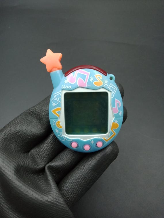 SKU B833P9942 | Bandai Japanese Tamagotchi V4.5 Uratama Music Blue
