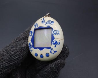 SKU B788P8906 | Bandai Tamagotchi White New Species Discovered - Etsy