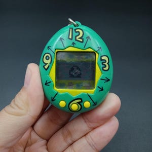 SKU YU 312 | Tamagotchi First Generation Clock Bandai Japanese