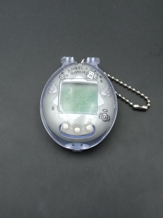SKU B913P11653TA8 |バンダイ たまごっち エンジェルゴッチ シルバー