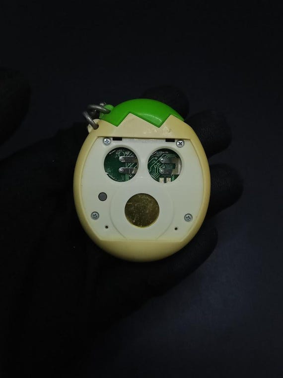 SKU | Bandai Tamagotchi Osutchi Green Virtual Pet - Etsy