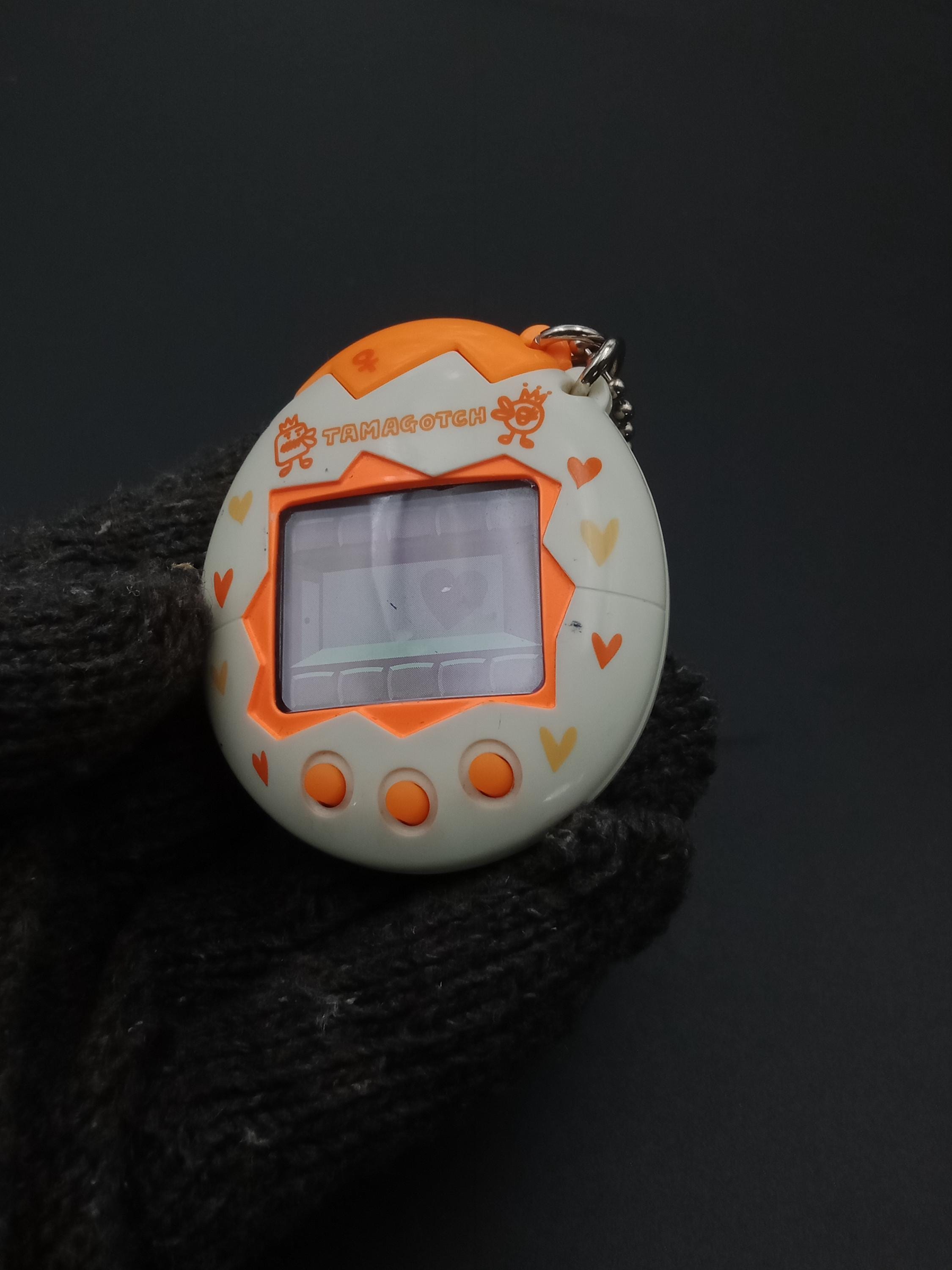 SKU B780P8768 | Bandai Tamagotchi Osutchi and Mesutchi Digital Pet