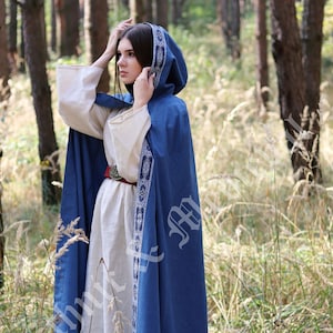 May include: A handmade wooden sign with the text "Welcome" in a handwritten style. The sign is painted white with a distressed finish and features a small, decorative heart. It is designed for indoor or outdoor use.