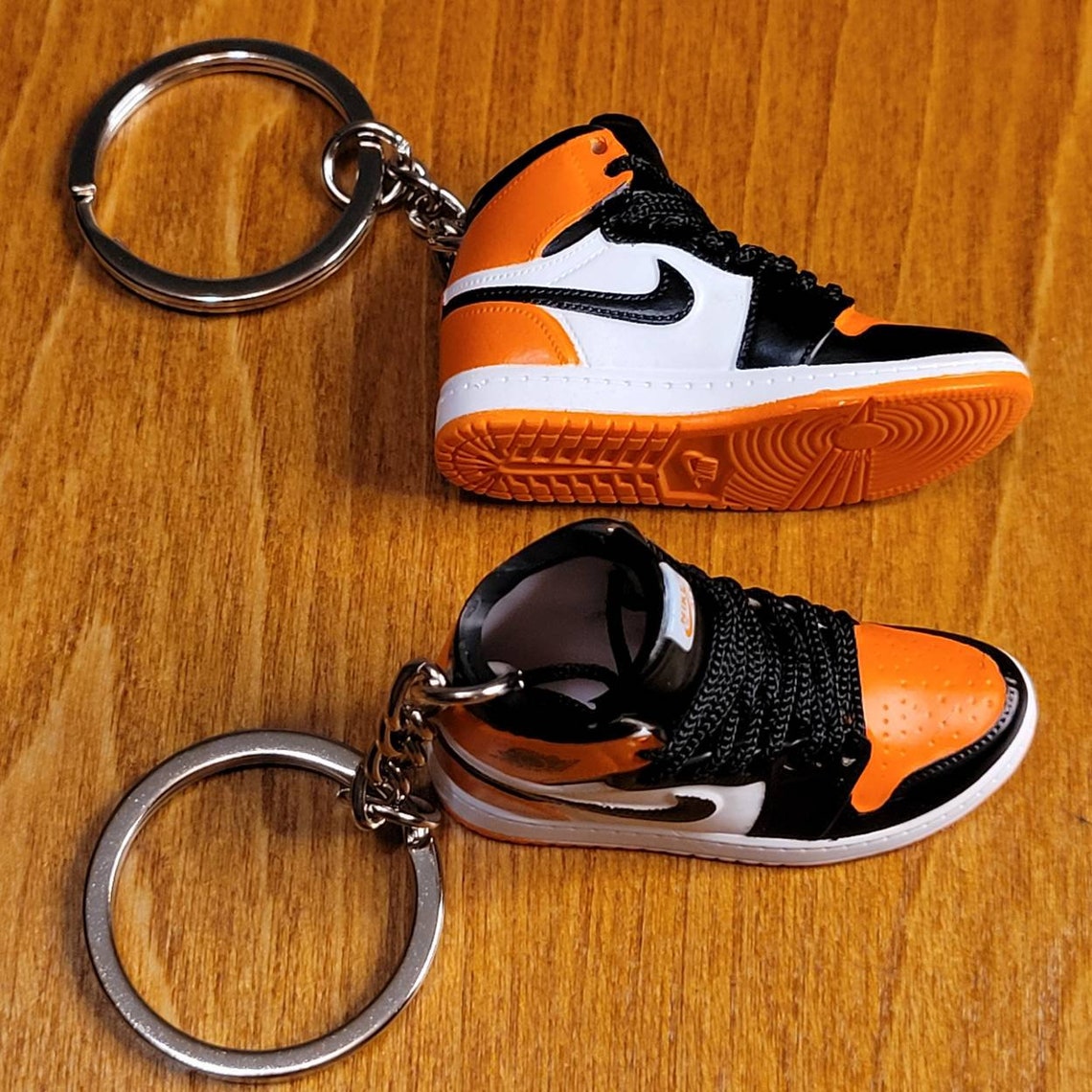 thumbnail image 2 of 100-Pack 2D Sneaker Keychains – Hype Beast Shoe Lot – Multi-Color PVC 2 of 6