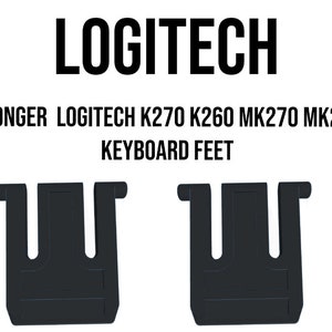 May include: Two black keyboard feet, designed for Logitech K270, K260, MK270, and MK270R keyboards, are displayed against a white background. The word "LOGITECH" is at the top, with product information below.