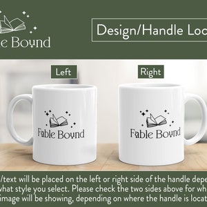May include: Two white coffee mugs with a black and white design of a book with stars. The text "Fable Bound" is printed on the mug. The mugs are shown from the side, one with the design on the left side of the mug and the other with the design on the right side of the mug.