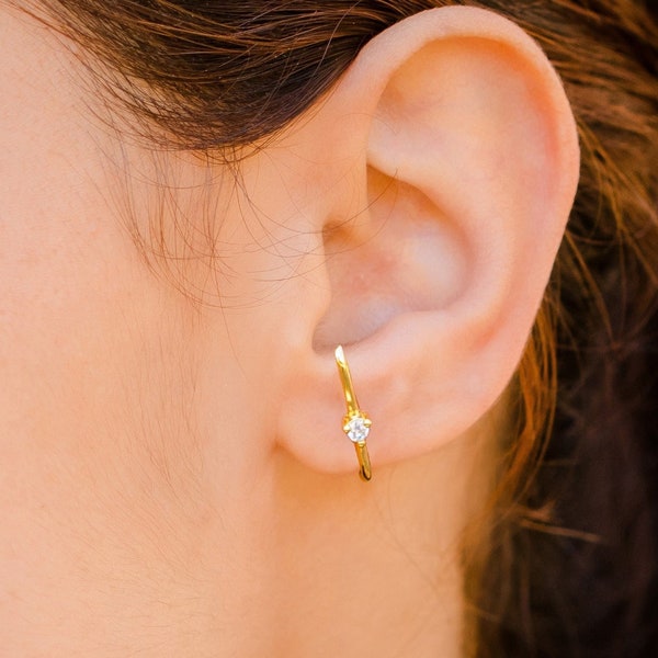 Ear cuff style earrings with zirconite with 3 claws. Earrings with zirconite, Ear cuff gold earrings