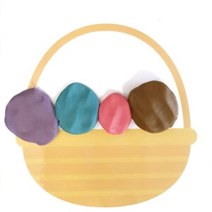 Easter basket playdough mat with playdough eggs added.