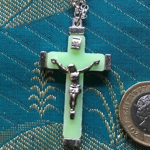 BLESSED Glow in dark  green Crucifix with platinum plated chain.