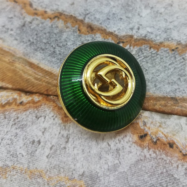 1 Knopen groen en goud. 20 mm