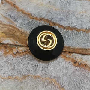 1 Buttons black/gold 20mm