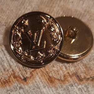 1 Buttons gold 23mm