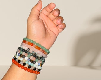 Set van 10 mysterieuze kristallen armbanden