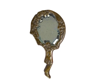 Antique handheld mirror with Pierrot and half moon made of metal around 1910s - 1920s