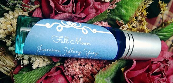 Full Moon Perfume Roll-On with Moonstone and Ruby Zoisite chips.